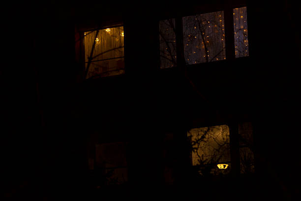 istock A dimly lit room that has a soft light shining through the windows at night 2229116252