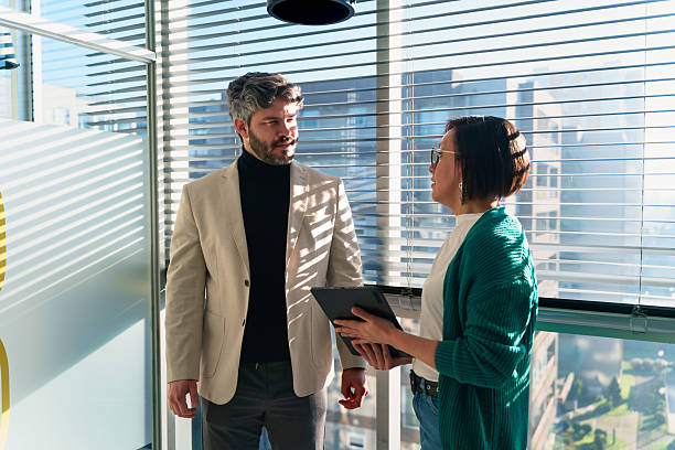 istock Latin american business people collaborating in modern office 2229118222