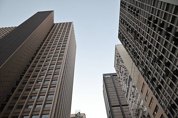 istock perspective of modern building, looking up 2229125631