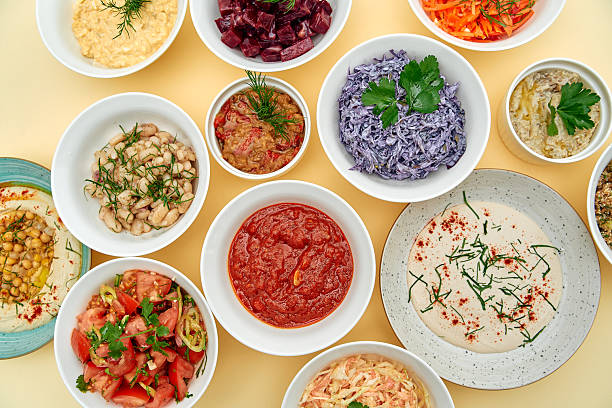istock A Vibrant Array of Colorful Dishes Showcasing Diverse Flavors and Textures in Various Bowls Garnished with Fresh Herbs and Vegetables 2229126849