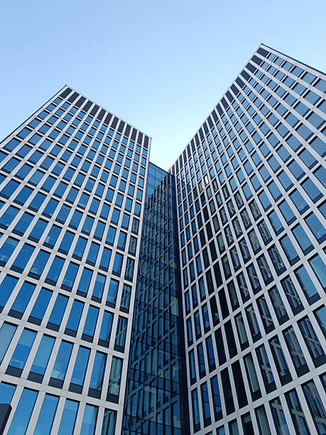 istock Modern Skyscrapers with Glass Facades Viewed from Below 2229127523