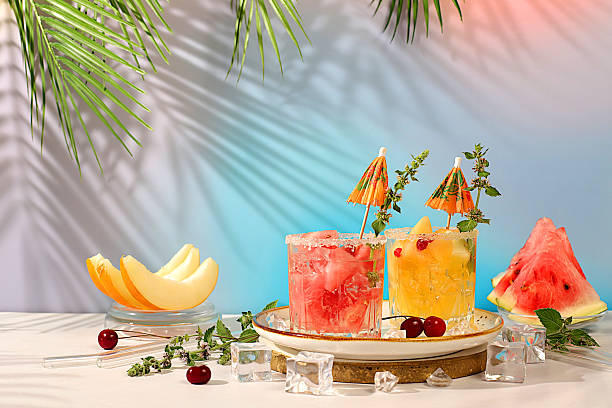 istock Mojito with melon, mint, watermelon, ice with tequila, vodka or soda water on elegant background, minimalist concept for bar, soft drink for weight loss, advertising banner for cafe 2229128063