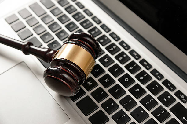 istock Cybercrime concept with gavel on laptop 2229128307