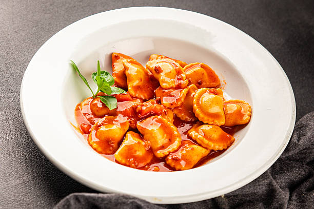 istock Ravioli beef tomato sauce second course fresh delicious gourmet food background on the table rustic food top view copy space 2229128536