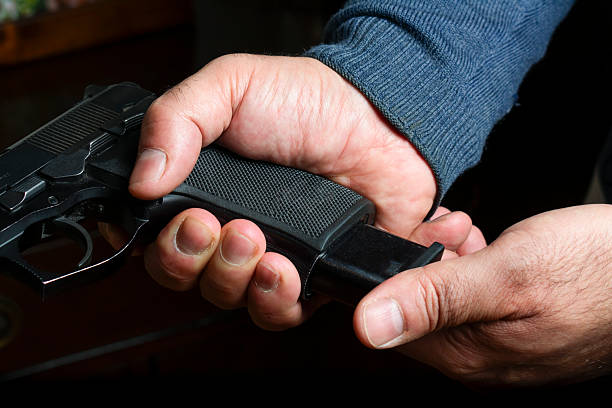 istock Skilled Gun Enthusiast Preparing for Shooting Session 2229129463