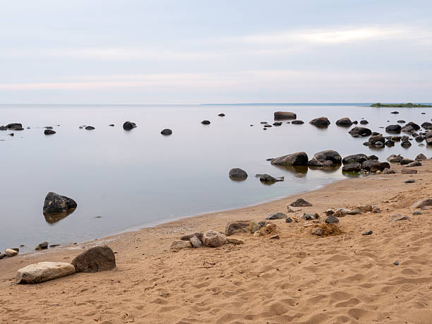 istock sandy beach with big stones in summer 2229130029