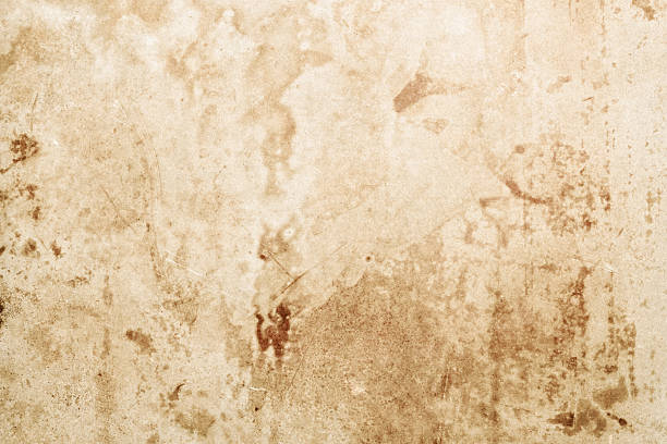 istock Aged parchment texture with brown stains and weathered appearance 2229131294