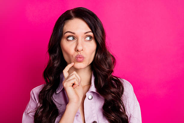 istock Photo of optimistic brunette nice lady finger face look empty space wear light jacket isolated on vibrant pink color background 2229131623