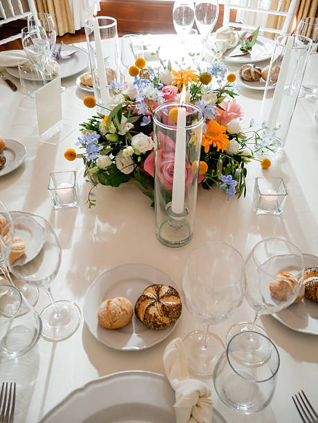 istock Elegant wedding reception table setting with floral centerpiece 2229131690