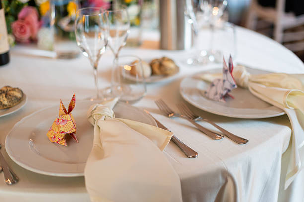 istock Elegant table setting with origami rabbits at wedding reception 2229132351
