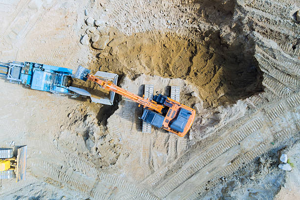 istock Heavy machinery working on construction site during works day hours 2229138272