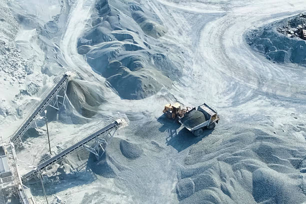 istock Loading and transportation of stone chips on dump trucks in quar 2229141251