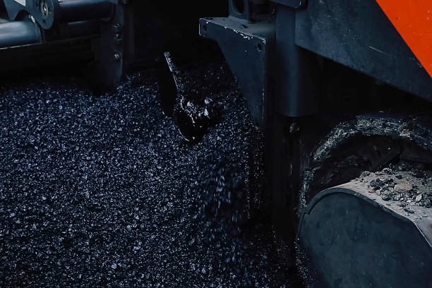 istock Preparation of asphalt from, crushed stone and bitumen resin. 2229141300