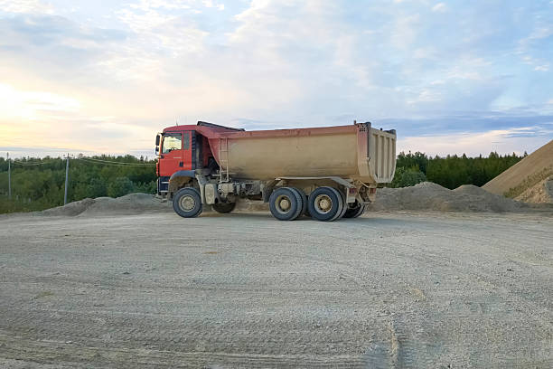 istock large red dump truck on a car site in a granite quarry. 2229142837