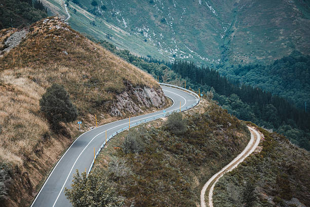istock Curvy road in scenic mountain landscape 2229143577