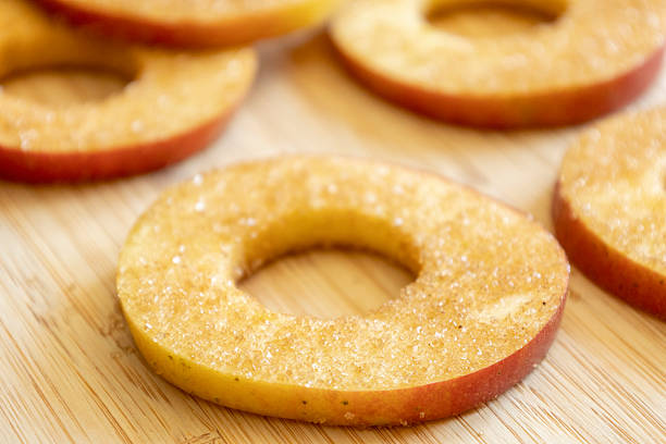 Sliced peeled apples background.