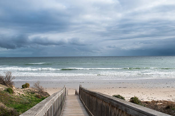 a view of the boardwalk to the popular Aldinga Beach, South Australia. This is a popular tourist destination on the coastal town.