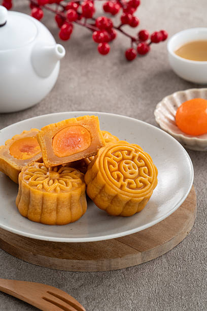 istock Traditional Cantonese moon cake with salted egg yolk filling and lotus seed paste. 2229164964