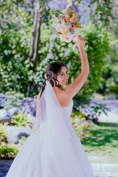 istock Smiling bride in white dress 2229165347