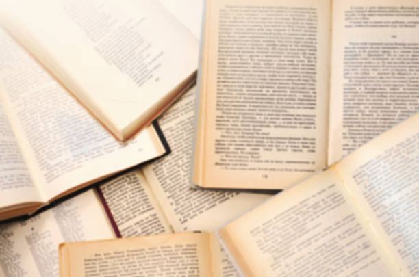 istock Top view of open books blurred background. 2229166751