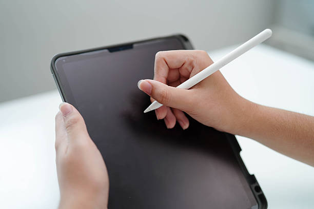 istock Teenage using tablet for communication, search data internet website to learn. 2229167865