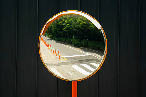 istock Traffic Mirror Reflecting Road Scene 2229171090