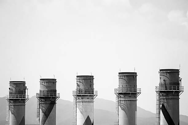Row of Industrial Chimneys in Monochrome