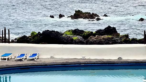 istock A Relaxing Coastal Oasis Featuring a Pool and Stunning Ocean View for an Ideal Escape 2229177411