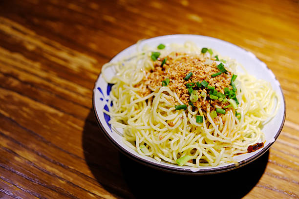 chinese cold noodles on wooden table