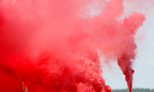 istock A red cloud of smoke is rising from a fire 2229178486