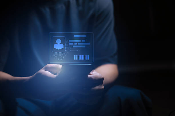 istock Digital identification or digital ID. Businessman and hand touch virtual screen of digital identification card to accessing databases by digital identity for cyber security. Employee badge. 2229179791