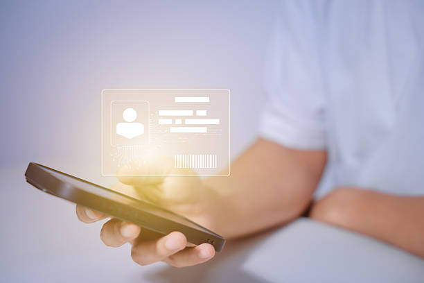 istock Digital identification or digital ID. Businessman and hand touch virtual screen of digital identification card to accessing databases by digital identity for cyber security. Employee badge. 2229179792