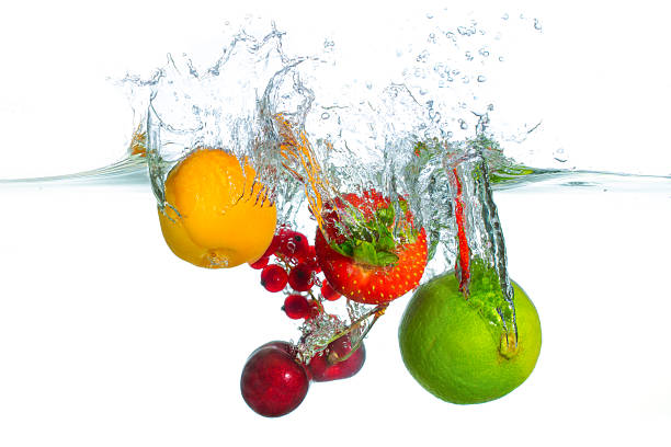 istock Vibrant Fresh Fruits Splashing into Crystal Clear Water 2229182643