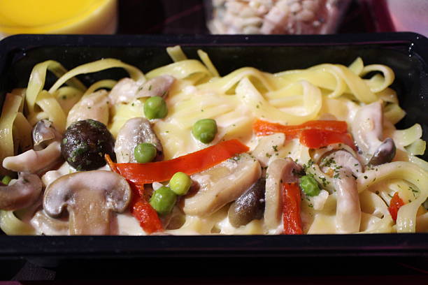 Economy class meal: mushroom cream pasta