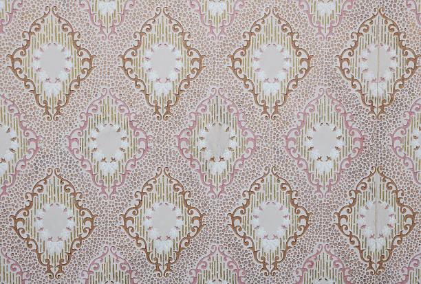 istock Old wallpaper on the wall. Old wallpaper for texture or background. 2229187258
