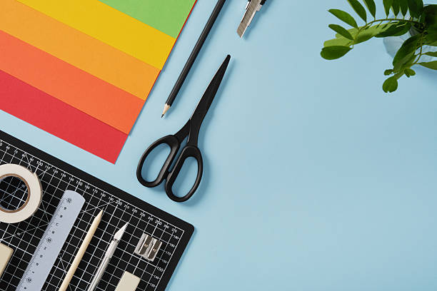 istock Colorful craft supplies on a blue background with copyspace for your text. Concept of creativity, design, and art projects 2229187477