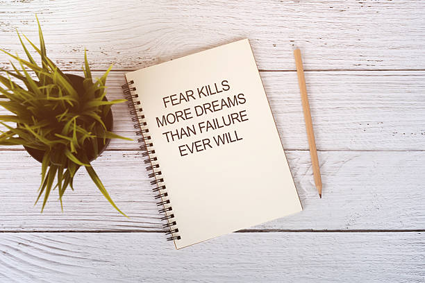 istock Notepad with quotes fear kills more dreams than failure ever will 2229187640