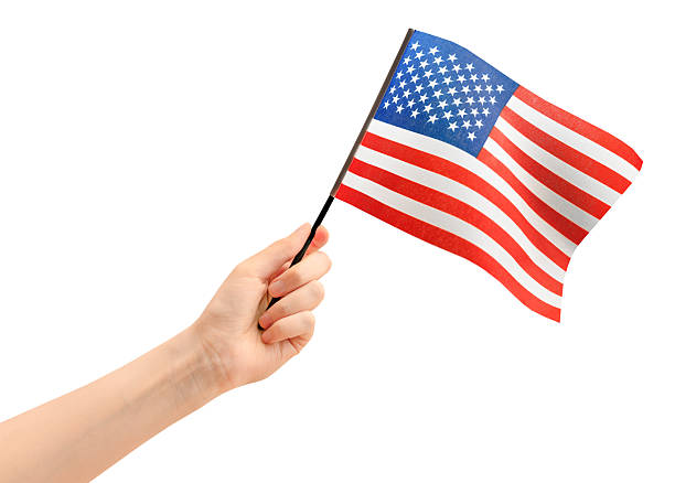 istock hand holding American flag 2229190515
