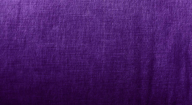 istock purple fabric texture background with subtle sheen. Elegant textile surface for design, fashion, upholstery, or abstract backdrop. High-quality natural fibers. 2229193708