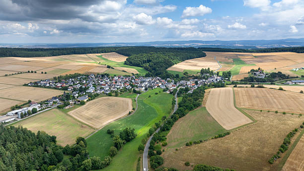 istock Agricultural fields and rural scene - aerial view 2229202709