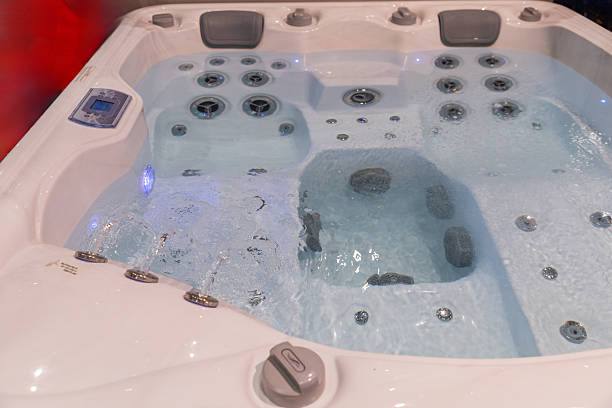 istock Modern hot tub with bubbling water and illuminated jets for relaxation and wellness experience 2229202887
