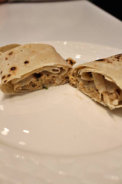istock Chicken tikka wrap sandwich in Doha, Qatar 2229204562
