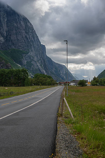 istock Scenic Road with Cliffs and Green Fields in Lysefjord, Norway 2229210822