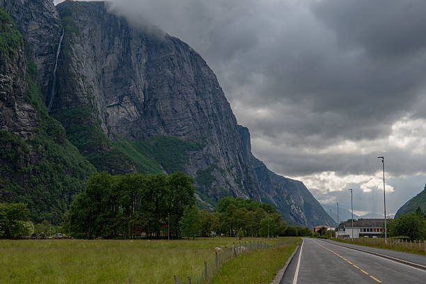istock Mountainous Landscape with Waterfall and Road in Lysebotn, Norway 2229210853