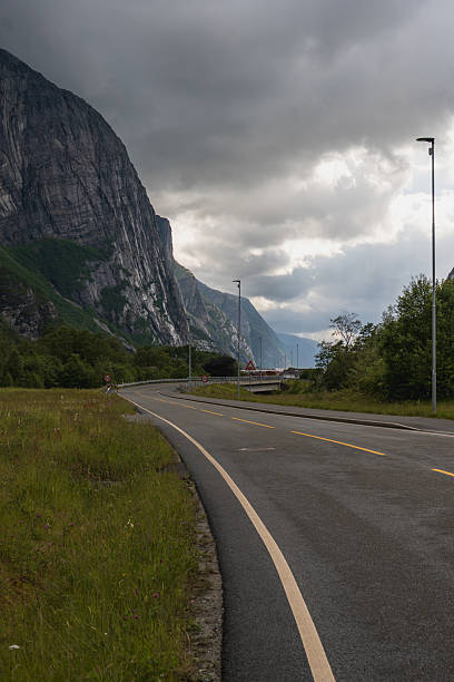 istock Winding Road and Cliff Face in Lysebotn, Norway Under Overcast Sky 2229211687