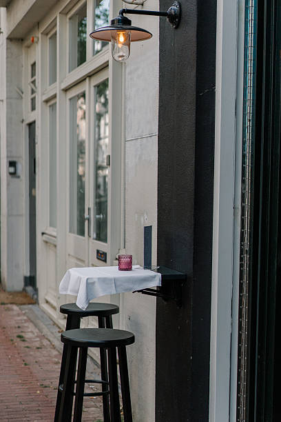 istock small tiny street cafe in the city for two persons 2229212025