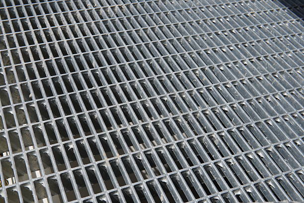 istock New Galvanized Steel Pathway Mesh. Durable metal mesh with a rough texture. Industrial steel construction provides durability and drainage. 2229212780