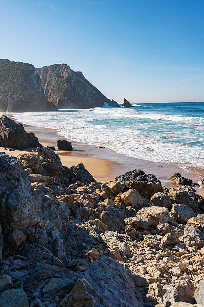 istock Rocks and surf on a quiet Portuguese seaside 2229213411