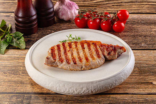 istock Juicy grilled pork fillet steak 2229216133