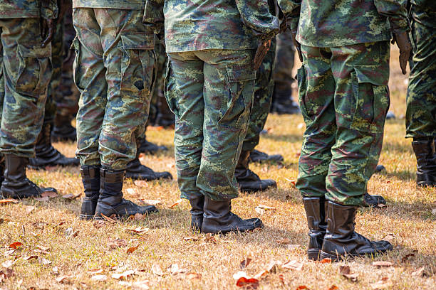 istock Soldiers participating in intense military training, as part of endurance and teamwork exercises, showing discipline and military readiness. 2229217701